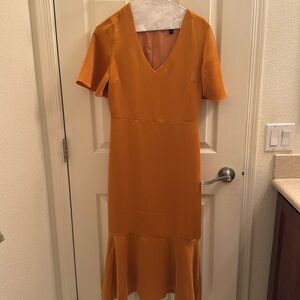 Marigold dress with mermaid style bottom.